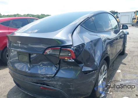 2023 Tesla Model Y Awd/Long Range Dual Motor All-Wheel Drive z USA, uszkodzony, nr VIN 7SAYGDEE5PA184258